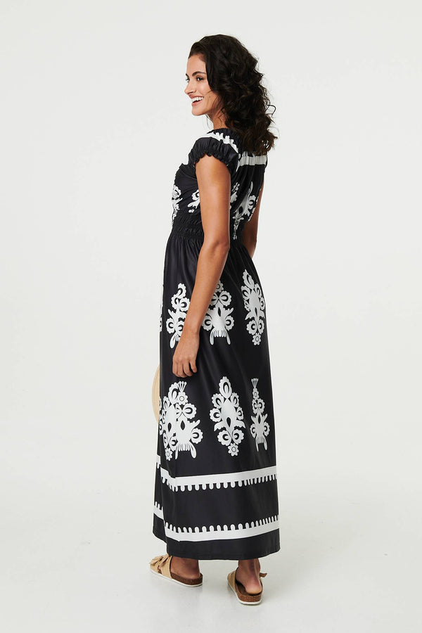 Black | Ikat Print Ruched Cap Sleeve Maxi Dress