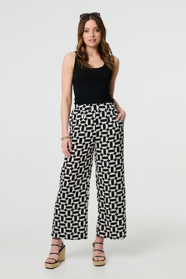 Black | Geo Print High Waist Wide Leg Trousers : Model is 5'9"/175 cm and wears UK8/EU36/US4/AUS8