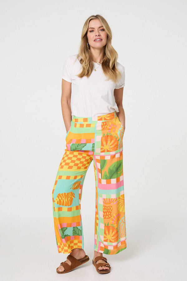 Orange | Tropical Tile Print Wide Leg Trousers : Model is 5'10"/178 cm and wears UK8/EU36/US4/AUS8