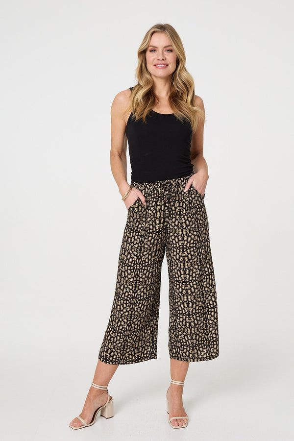 Black | Printed Drawstring Waist Crop Trousers : Model is 5'10"/178 cm and wears UK8/EU36/US4/AUS8