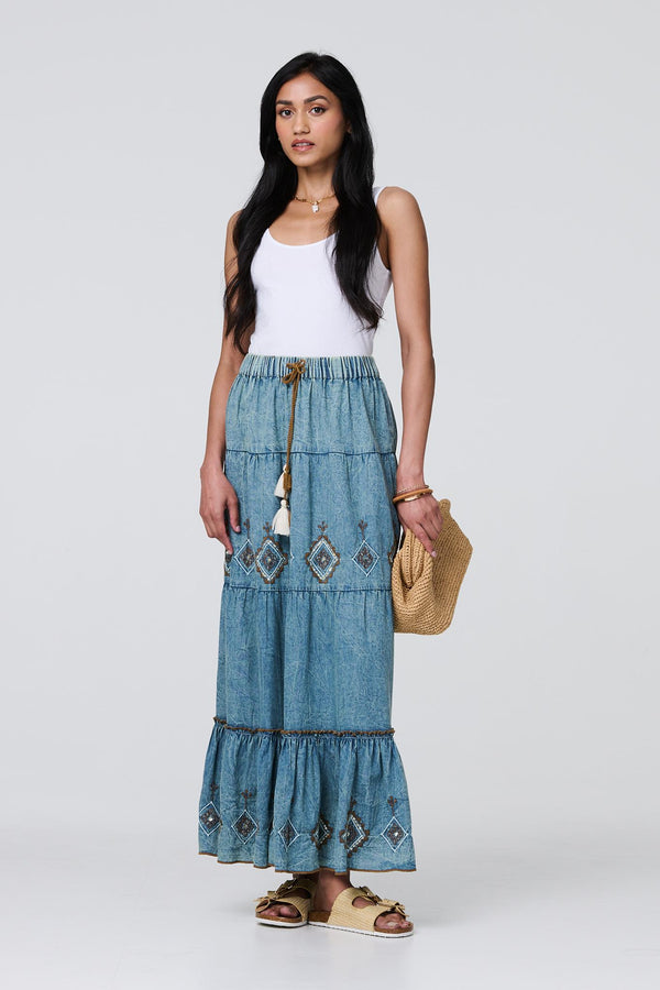 Indigo | Embroidered Tiered Tassel Waist Maxi Skirt