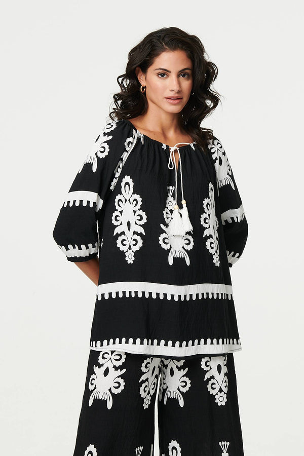 Black | Ikat Print Tassel Tie Neck Blouse