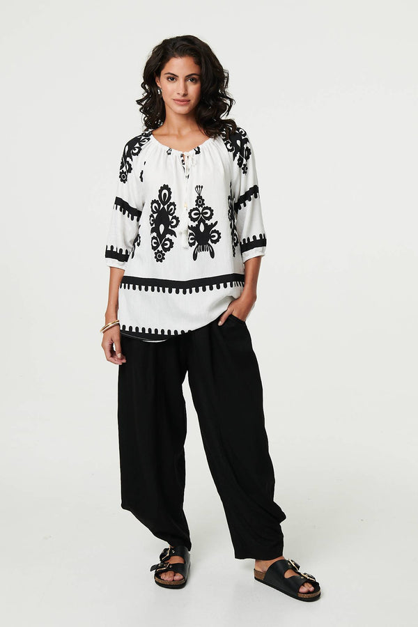 White | Ikat Print Tassel Tie Neck Blouse