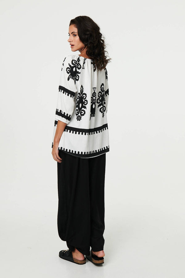 White | Ikat Print Tassel Tie Neck Blouse