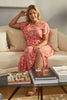 Coral | Printed Short Sleeve Midi Dress : Model is 5'8