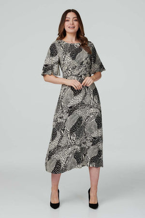 Black | Animal Print Midi Tea Dress : Model is 5'9"/175 cm and wears UK8/EU36/US4/AUS8