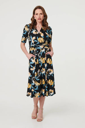 Black | Floral Short Sleeve Faux Wrap Midi Dress : Model is 5'9