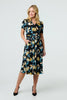 Black | Floral Short Sleeve Faux Wrap Midi Dress : Model is 5'10