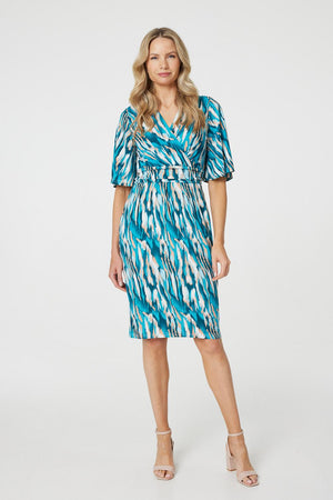 Green | Printed 1/2 Angel Sleeve Faux Wrap Dress : Model is 5'10