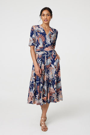 Navy | Tropical Print 1/2 Sleeve Midi Wrap Dress : Model is 5'8