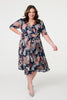 Navy | Tropical Print 1/2 Sleeve Midi Wrap Dress :  Model is 5'8