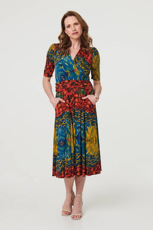 Blue | Printed Ruched Waist Faux Wrap Midi Dress : Model is 5'9