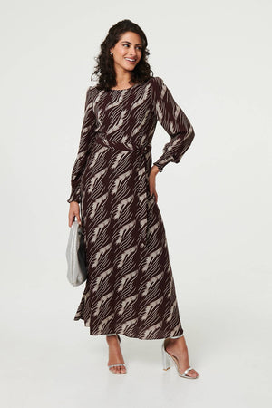 Brown | Printed Tie Waist Semi Sheer Maxi Dress : Model is 5'8