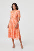 Orange | Printed 3/4 Sleeve Ruched Midi Dress : Model is 5'8