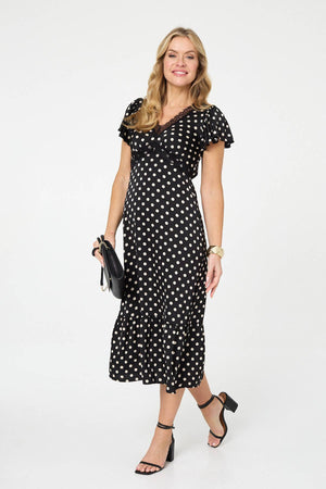 Black | Polka Dot Lace Trim Empire Midi Dress : Model is 5'10