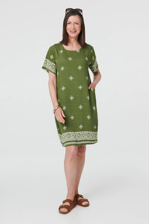 Green | Border Print Knee Length Shift Dress : Model is 5'8