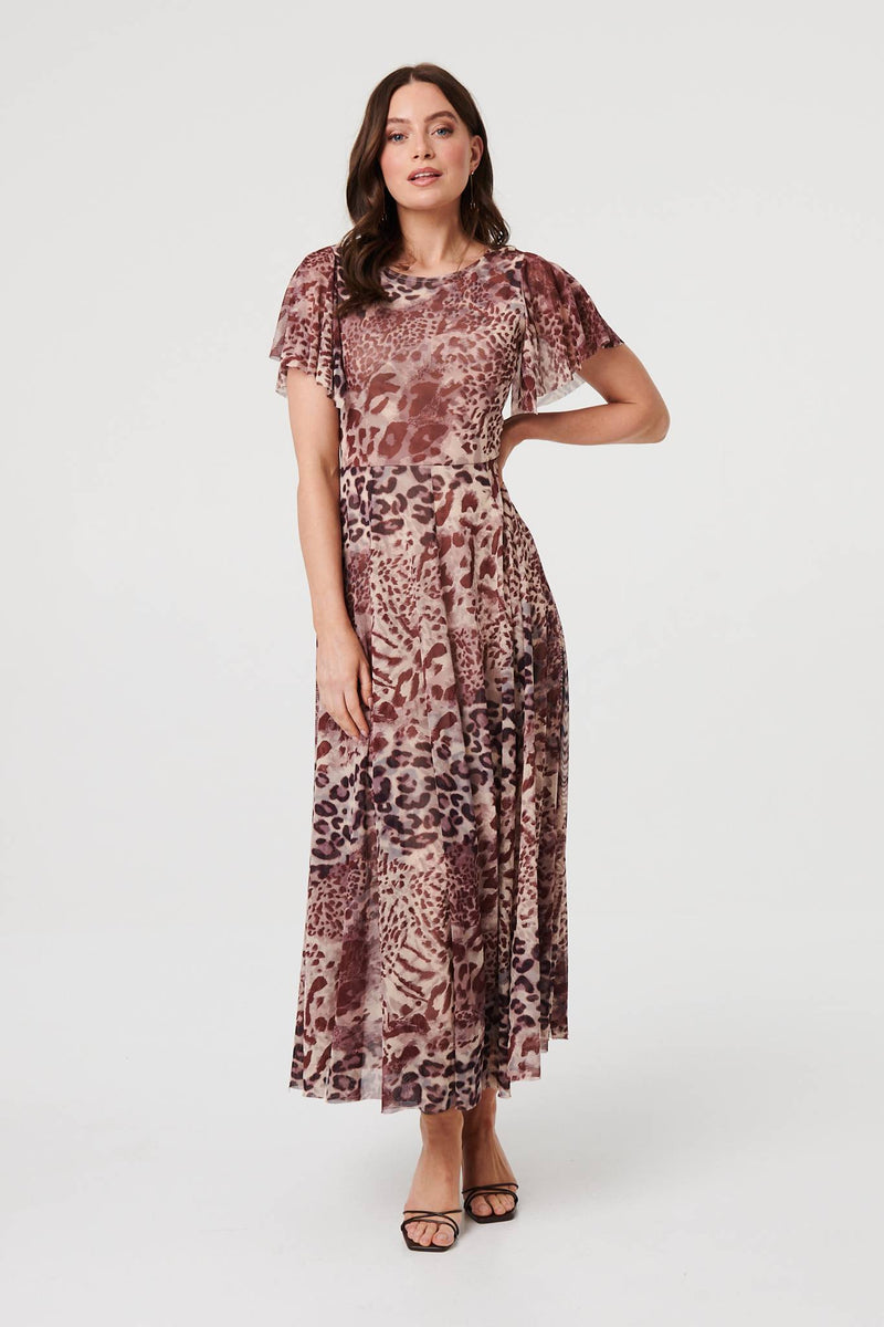 sachin and babi light blue dress Leopard print dress is one of those timeless fashion pieces that instantly  elevates any look., Whether it’s a casual day or a night out, this flowy  leopard maxi dress adds confidence, femininity, and