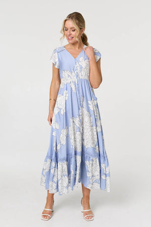 Blue | Floral Cap Sleeve Button-Up Maxi Dress : Model is 5'10