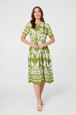 Green | Abstract Short Sleeve Tiered Midi Dress : Model is 5'9