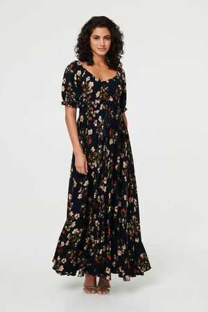 Navy | Floral Bardot Shirred Empire Maxi Dress : Model is 5'8
