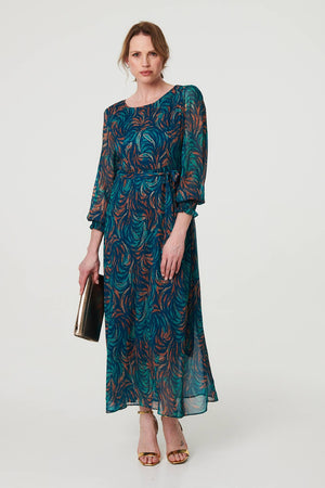 Teal | Abstract Long Sheer Sleeve Maxi Dress : Model is 5'9