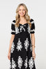 Black | Printed Puff Sleeve Tie Front Midi Dress : Model is 5'10