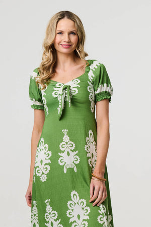 Green | Printed Puff Sleeve Tie Front Midi Dress : Model is 5'10