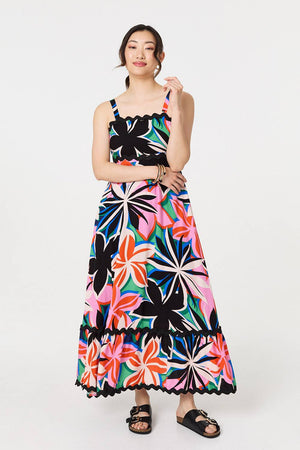 Black | Floral Wave Trim Sleeveless Maxi Dress : Model is 5'9
