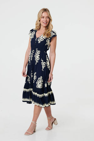 Navy | Ikat Print Cap Sleeve Shirred Midi Dress : Model is 5'10