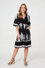 Black | Ikat Print 1/2 Sleeve Relaxed Short Dress : Model is 5'10