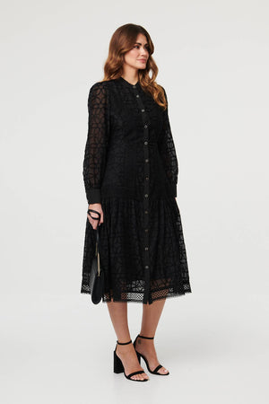 Black | Printed Long Sleeve Smocked Maxi Dress : Model is 5'9