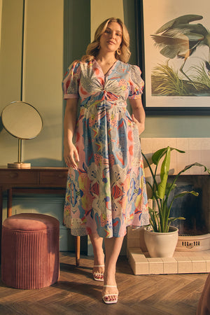Blue | Abstract Ruched Front Empire Midi Dress : Model is 5'8