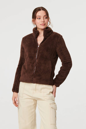 Brown | Soft Texture Zip Front High Neck Fleece : Model is 5'9