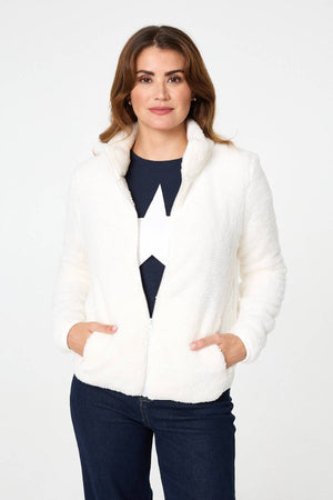 Ivory | Soft Texture Zip Front High Neck Fleece : Model is 5'9