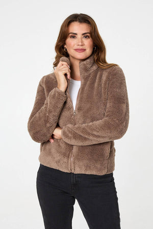 Tan | Soft Texture Zip Front High Neck Fleece : Model is 5'9