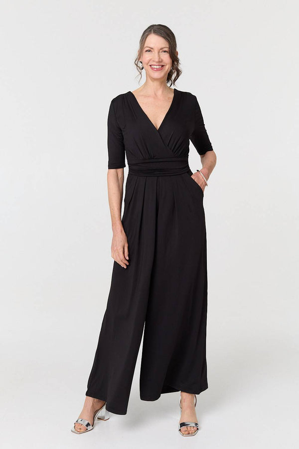 Black | 1/2 Sleeve Wrap Waist Wide Leg Jumpsuit
