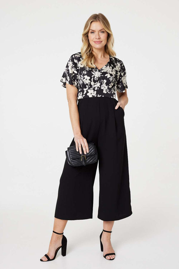 Black | Floral Block Print Wide Leg Jumpsuit : Model is 5'10"/178 cm and wears UK8/EU36/US4/AUS8