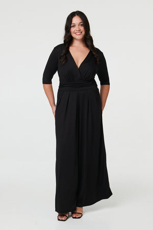 Black | Curve 1/2 Sleeve Wrap Wide Leg Jumpsuit : Model is 5'8