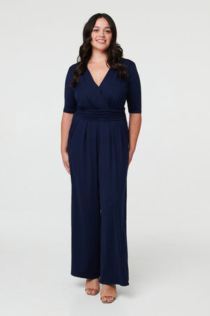 Navy | Curve 1/2 Sleeve Wrap Wide Leg Jumpsuit : Model is 5'8
