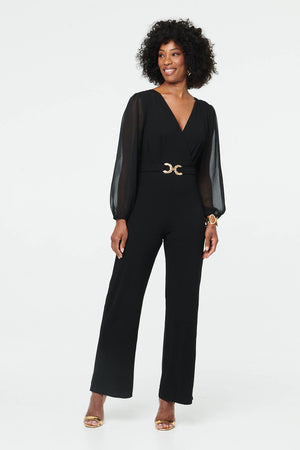 Black | Semi Sheer Long Sleeve V-Neck Jumpsuit : Model is 5'9