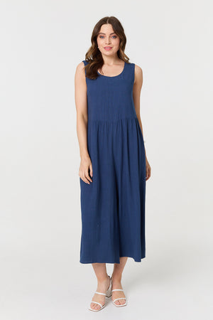 Indigo | Relaxed Sleeveless Wide Crop Jumpsuit : Model is 5'9