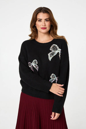 Black | Sequin Bow Detail Drop Shoulder Jumper : Model is 5'9