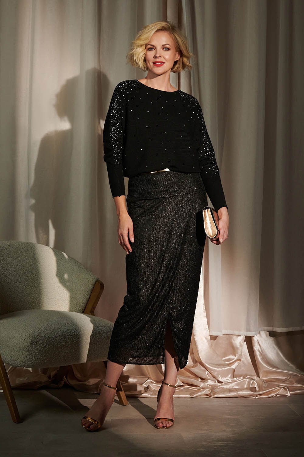 Black | Sequin High Waist Wrap Skirt : Model is 5'10"/178 cm and wears UK10/EU38/US6/AUS10