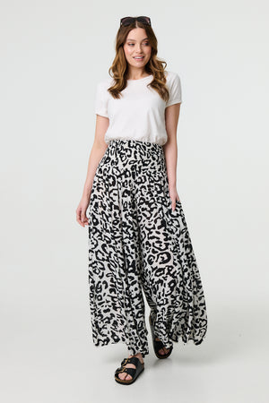 White | Animal Print High Waist Palazzo Pants : Model is 5'9