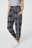 Black | Printed Smocked Waist Harem Pants
