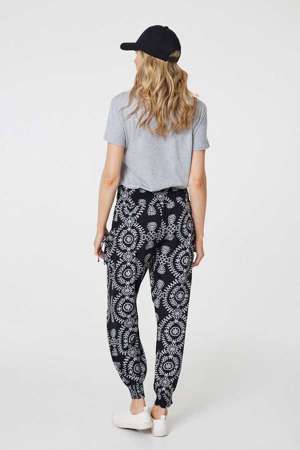 Black | Printed Smocked Waist Harem Pants
