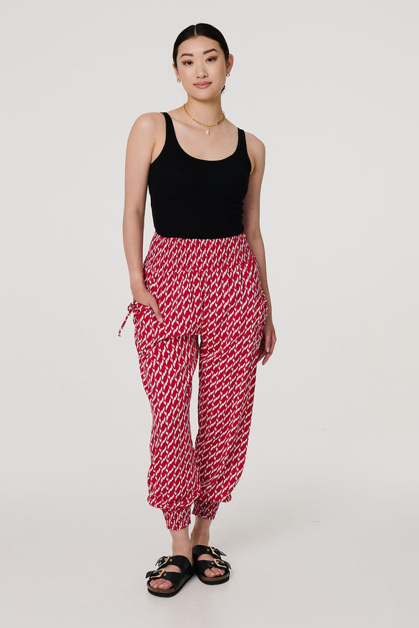 Red | Printed Tapered Harem Trousers