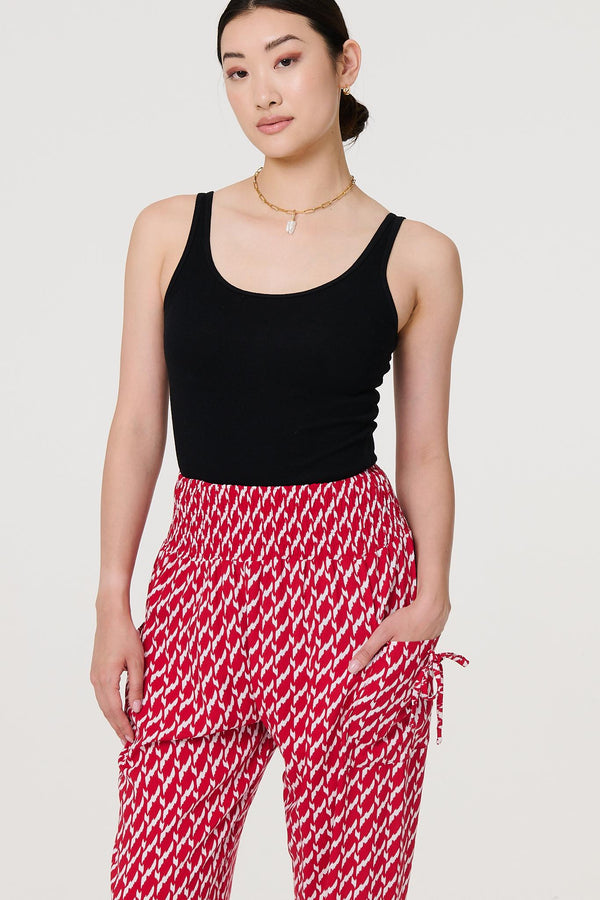 Red | Printed Tapered Harem Trousers