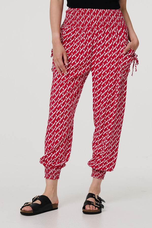 Red | Printed Tapered Harem Trousers