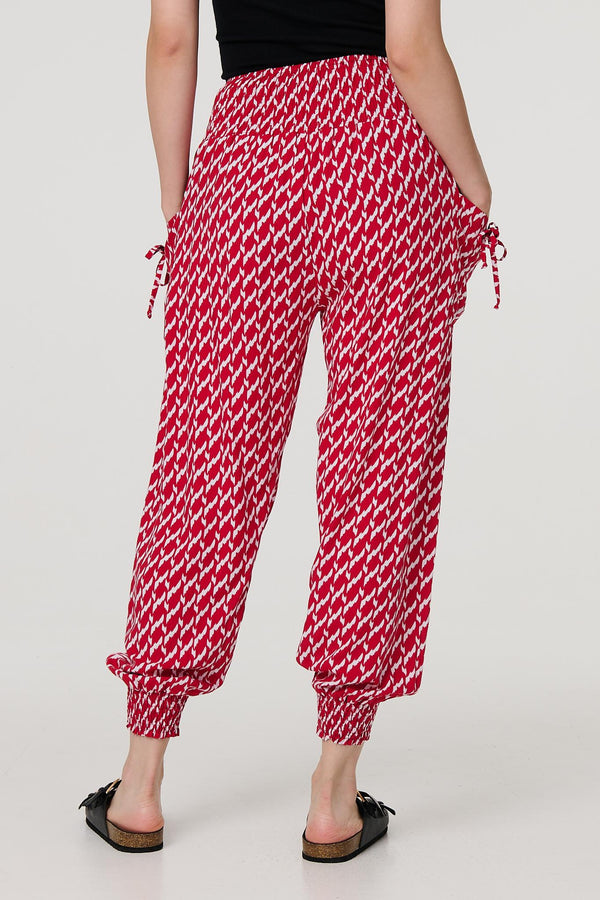 Red | Printed Tapered Harem Trousers
